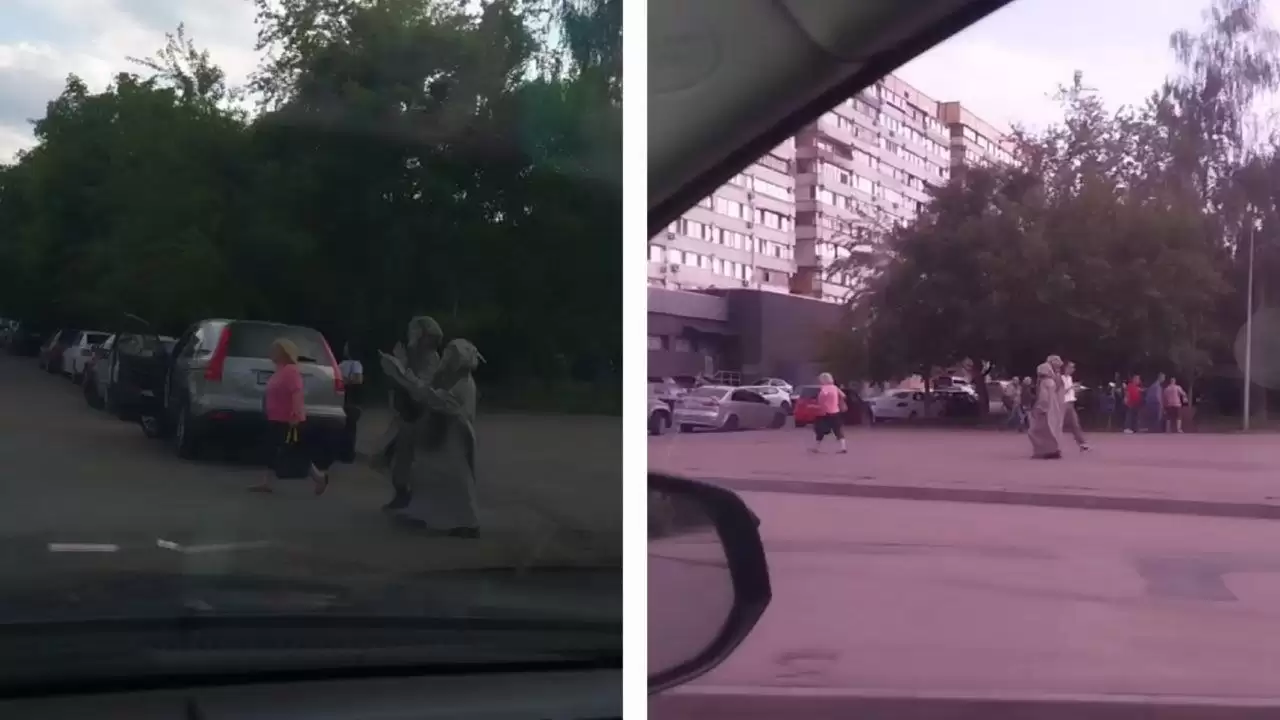Двоє жителів Дніпра гуляли по місту в протигазах та захисних мантіях