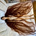 Жінка, яка жила на Житомирщині, потрапила до Книги рекордів Гіннеса за найдовше волосся